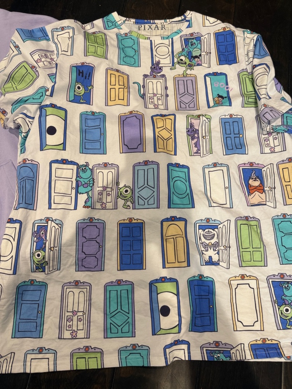 Monsters Inc sweatshirt and tee by Cakeworthy
Super cute - Picture 2 of 3
